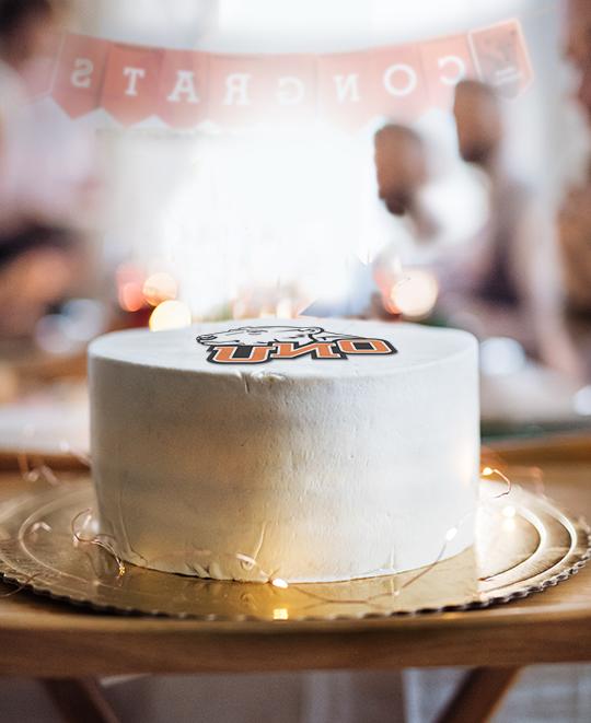 graduation cake logo